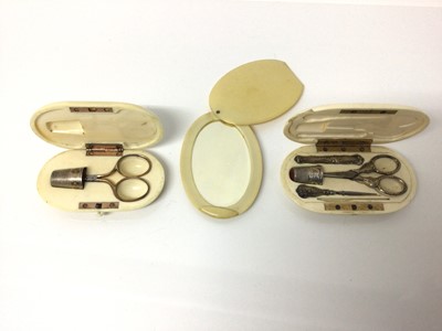 Lot 6 - Two 19th century ivory cased etui cases and cased mirror