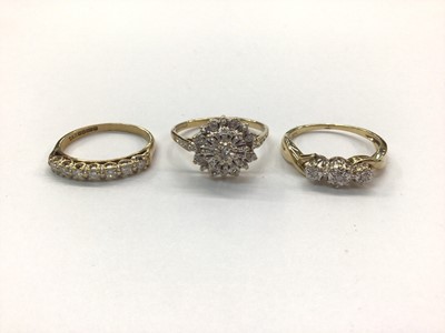 Lot 655 - Three 9ct gold diamond set dress rings