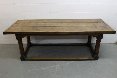 Lot 1283 - 17th century style oak and fruitwood refectory dining table with plank top on turned legs joined by stretchers