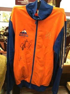 Lot 450 - Football related items to include signed Netherlands track suit top, framed reproduction cigarette cards