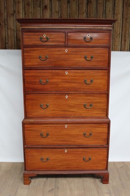 Lot 1336 - 19th century mahogany chest on chest, carved dentil cornice above two short and five long drawers, on bracket feet