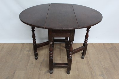 Lot 1344 - 18th century oak oval gateleg table of small proportions, with single drawer, on turned supports joined by stretchers
