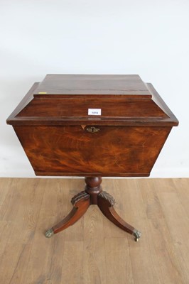 Lot 1019 - Victorian mahogany teapoy of sarcophagus form, on turned support and splayed tripod base