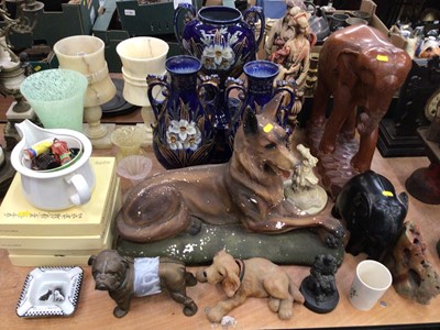 Lot 412 - Garniture of three early 20th century vases, plaster model of an Alsatian, Elephants, art glass vases and other items.
