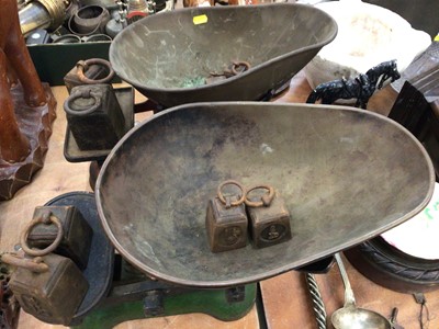Lot 413 - Two sets of vintage shop scales together with a carved wooden mantel clock (3)