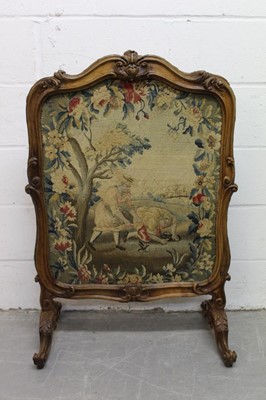 Lot 1302 - 19th century French carved walnut fire screen, utilizing an 18th century tapestry fragment