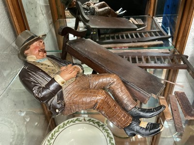 Lot 139 - Bernard Bloch pottery figure of a seated dozing man, 26cm high, together with partially complete bench