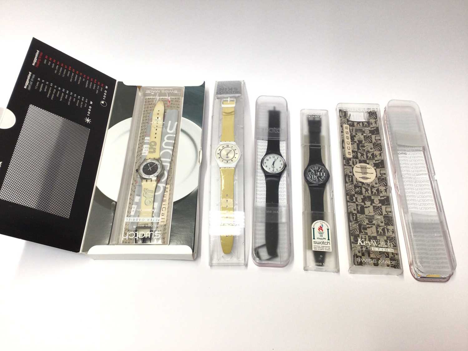 Lot 9 - Four Swatch wristwatches including Melody by Peter Gabriel, all cased as new