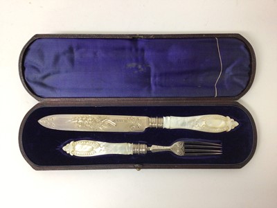 Lot 118 - Pair of Victorian mother-of-pearl-handled silver fish servers, Sheffield 1876, Richard Martin & Ebenezer Hall, in original velvet-lined case
