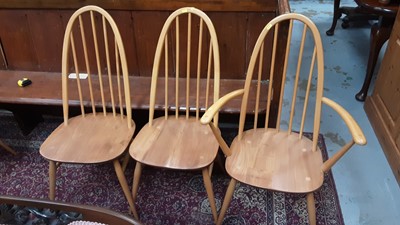 Lot 895 - Good quality Ercol dining table on splayed legs, 151cm x 75cm, together with a matching set of six stick back chairs comprising four standards and two carvers