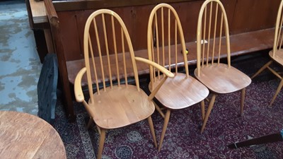 Lot 895 - Good quality Ercol dining table on splayed legs, 151cm x 75cm, together with a matching set of six stick back chairs comprising four standards and two carvers