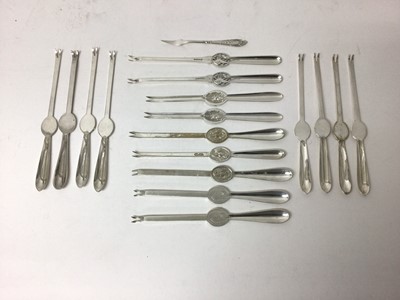 Lot 122 - Quantity of silver plated lobster picks