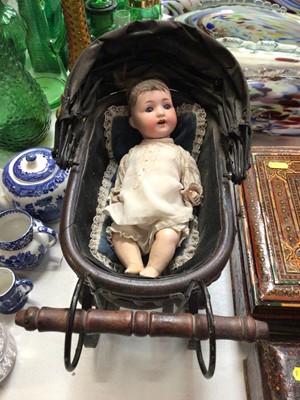 Lot 262 - Armand Marseille doll with bisque head marked Germany 995 A. 810. M, composite body and limbs within a vintage doll's pram