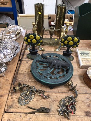 Lot 14 - Pair of fire dogs, pair of shell case vases, trivet, metalwares, etc