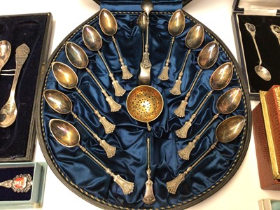 Lot 88 - Set twelve German silver (800) teaspoons, sifting spoon and pair sugar tongs in fitted case, six India souvenir spoons stamped sterling silver, other Continental silver spoons