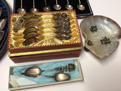 Lot 88 - Set twelve German silver (800) teaspoons, sifting spoon and pair sugar tongs in fitted case, six India souvenir spoons stamped sterling silver, other Continental silver spoons