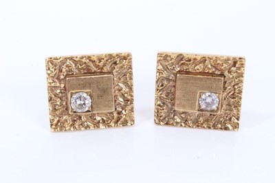 Lot 595 - Pair of gold cufflinks with diamonds