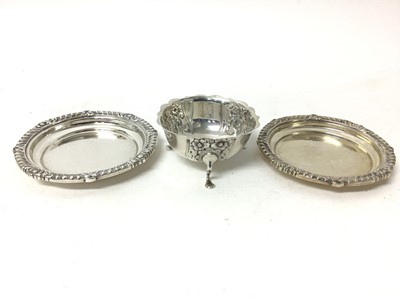 Lot 133 - Heavy pair of Goldsmiths & Silversmiths silver dishes with reeded borders, London 1937, together with a Goldsmiths & Silversmiths tripod bowl with relief moulded floral decoration and scalloped rim...