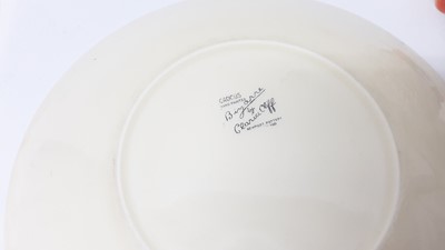 Lot 1025 - Three Clarice Cliff plates, together with a Celtic Harvest preserve pot (4)