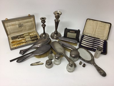 Lot 201 - Quantity of silver, including knives, brushes, toiletry jars, desk calendar, etc