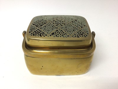 Lot 219 - 19th century Chinese brass hand warmer with pierced cover, 20cm across