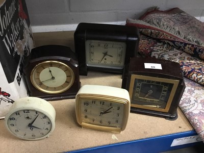 Lot 80 - Three vintage Bakelite cased clocks and two others