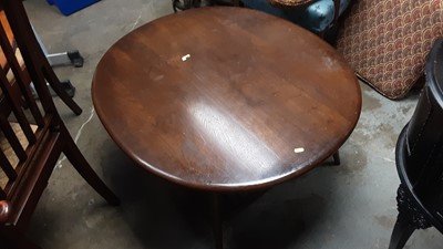 Lot 1000 - Ercol oval coffee table with magazine rack undertier, 98.5cm x 82cm