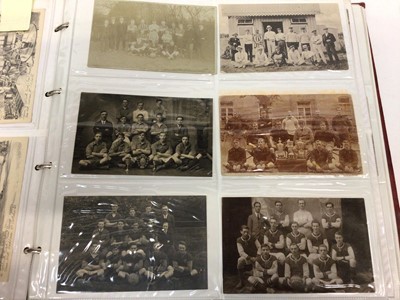 Lot 1400 - Postcards - An extensive collection in four albums.  Many early cards and real photographic cards including Military regiments, camps, parades, sports, Military Hospital, good animated street scene...