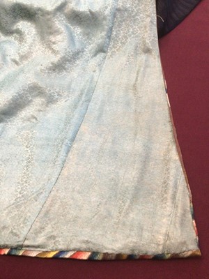 Lot 2057 - 19th Century Chinese embroidered brown silk robe with Horse Hoof cuffs, five Dragons and pale blue silk lining.
