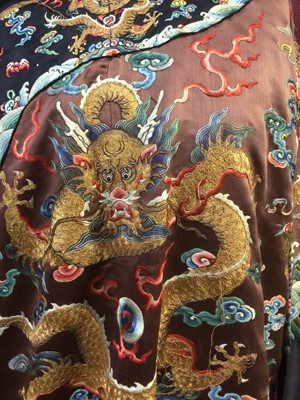 Lot 2057 - 19th Century Chinese embroidered brown silk robe with Horse Hoof cuffs, five Dragons and pale blue silk lining.