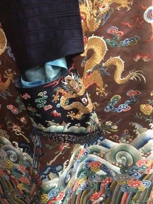 Lot 2057 - 19th Century Chinese embroidered brown silk robe with Horse Hoof cuffs, five Dragons and pale blue silk lining.