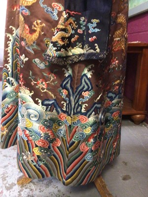 Lot 2057 - 19th Century Chinese embroidered brown silk robe with Horse Hoof cuffs, five Dragons and pale blue silk lining.