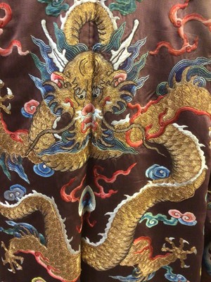 Lot 2057 - 19th Century Chinese embroidered brown silk robe with Horse Hoof cuffs, five Dragons and pale blue silk lining.