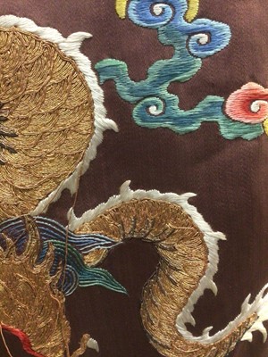 Lot 2057 - 19th Century Chinese embroidered brown silk robe with Horse Hoof cuffs, five Dragons and pale blue silk lining.