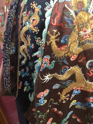 Lot 2057 - 19th Century Chinese embroidered brown silk robe with Horse Hoof cuffs, five Dragons and pale blue silk lining.