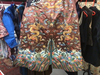 Lot 2057 - 19th Century Chinese embroidered brown silk robe with Horse Hoof cuffs, five Dragons and pale blue silk lining.