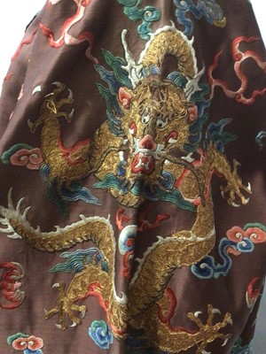 Lot 2057 - 19th Century Chinese embroidered brown silk robe with Horse Hoof cuffs, five Dragons and pale blue silk lining.