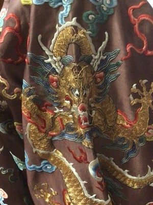 Lot 2057 - 19th Century Chinese embroidered brown silk robe with Horse Hoof cuffs, five Dragons and pale blue silk lining.