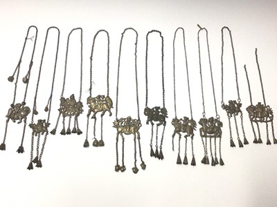Lot 36 - Collection of ten old Chinese silver/white metal pendant necklaces