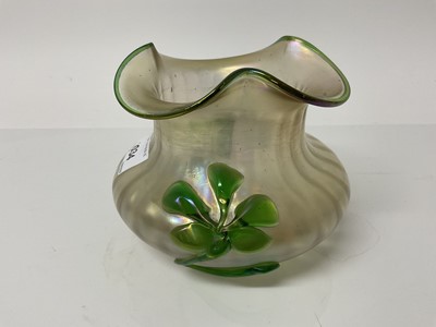 Lot 1318 - Loetz style Kralik iridescent glass vase decorated with a green flower, 11cm high