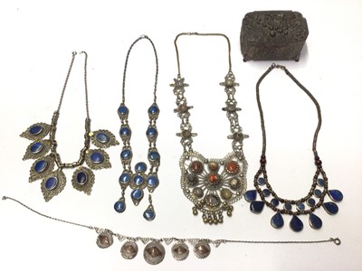 Lot 96 - Three Eastern white metal necklaces set with lapis lazuli, agate necklace, Egyptian necklace and a box