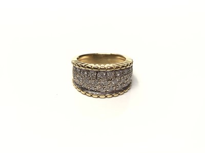 Lot 105 - 18ct gold diamond set thick band ring