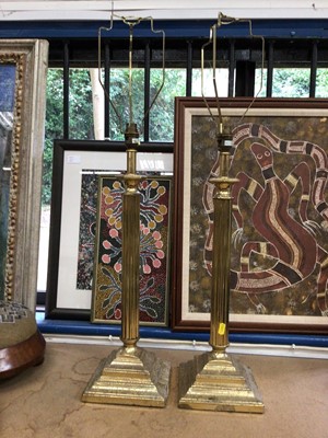 Lot 107 - Pair of brass lamps