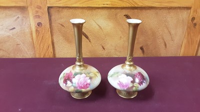 Lot 1280 - Pair of Worcester blush vases decorated with roses