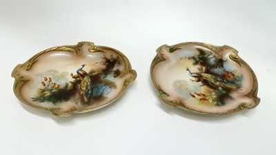 Lot 1282 - Two Worcester dishes by W. Powell decoration of peacocks (1907)