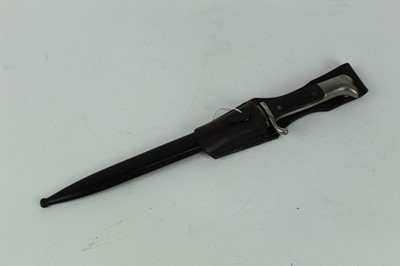 Lot 877 - Nazi Parade bayonet (long model) with black checkered platic grips, polished steel blade (retaining all original polish) by E. Pack, Solingen in scabbard with frog, dated 1941.