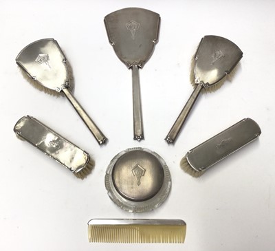 Lot 125 - 1930s six piece silver backed dressing table set with engraved initials and a similar comb (7)