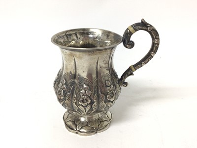 Lot 232 - Victorian silver mug with embossed floral decoration