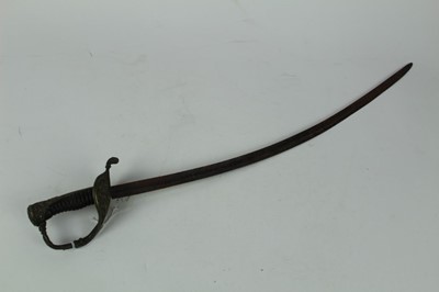 Lot 873 - French children's / practise sword with ribbed wooden grip, brass pommel and guard, with curved steel blade, 54.5cm overall length.