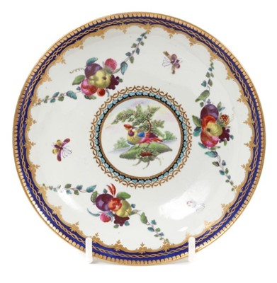 Lot 224 - An unusual Worcester small saucer dish, painted with an exotic bird, circa 1775